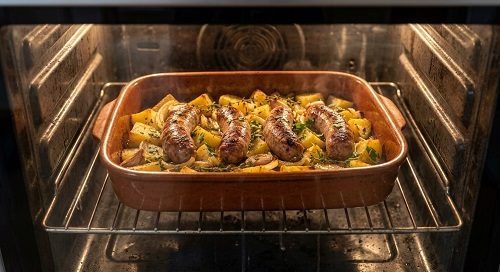Butifarra con patatas al horno